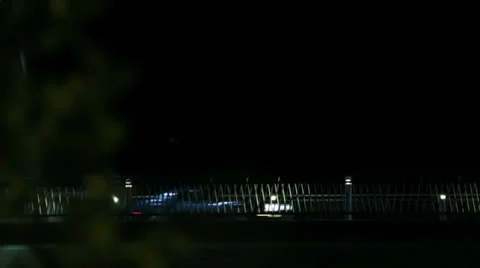 Quick drive by of Corvette at night Stock Footage 33001052