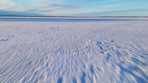 Quick drone flight over frozen lake Stock Footage 301263700