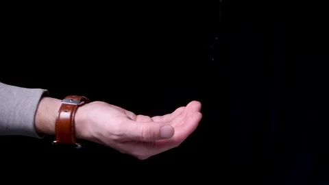 Quick financial aid help holding hand on black Vidéo 152665007