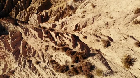 Quick Flight Over Eroded Desert Badlands - Drone Aerial Stock Footage 111389270
