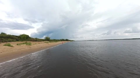 A quick flight over the river bank, it’s summer outside and the deserted beach Stock Footage 280851466