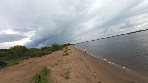 A quick flight over the river bank, it’s summer outside and the deserted beach Stock Footage 280851492
