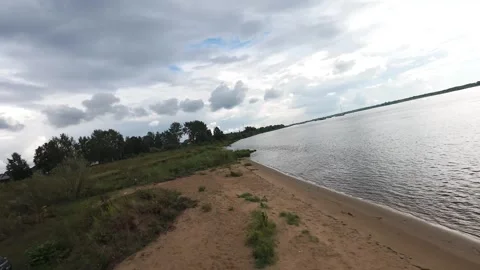 A quick flight over the river bank, it’s summer outside and the deserted beach Stock Footage 280851500