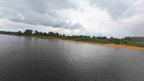A quick flight over the river bank, it’s summer outside and the deserted beach Stock Footage 280851518