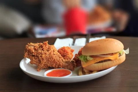 Quick lunch select focus blur background, Select focus fried chicken with blu Stock Photos