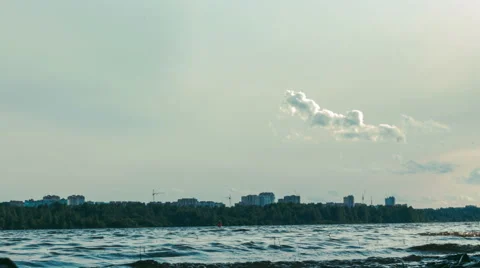 Quick movement of the waves on the river. background city buildings. Stock Footage 65094697