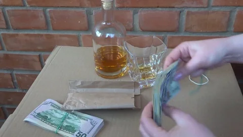 Quick packing pile of dollar bills by female hands Stock Footage 97918554