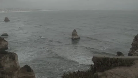 Quick Pan Overlooking Beach in Southern Portgual, Overcast Stock Footage 188588186