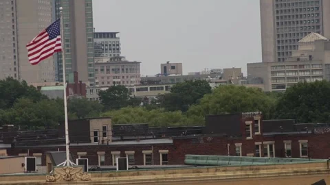 A quick panning shot from American flag to stadium stage Stock Footage 159908742