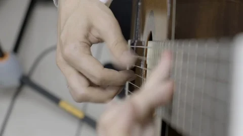Quick play guitar right hand Stock Footage 114634884