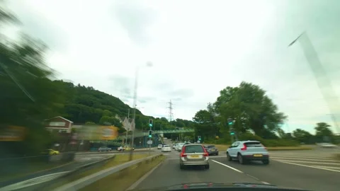 Quick POV Car Timelapse from Motorway M4 Freeway onto Roundabouts and Busy Stock Footage 314360564