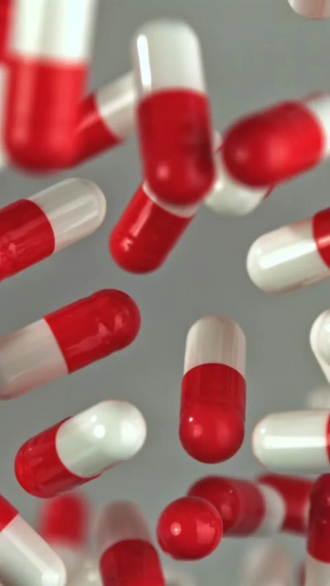 Quick sequence of capsules with distinct textures and vibrant coloring Filmed on Stock Footage 335396101