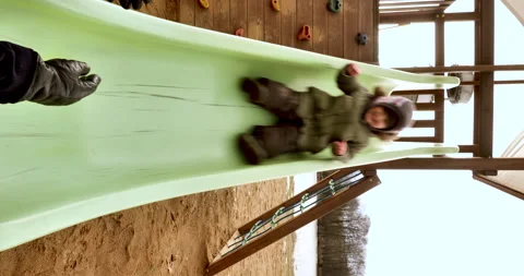 Quick Slide Down Children's Slide in Mom's Hand 動画素材 238763820
