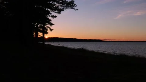 Quick sunset time lapse over the forest and sea Stock-Footage 165179185