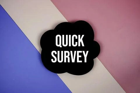 Quick Survey text on speech bubble top view on purple geometric background Stock Photos