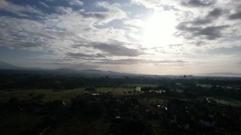 A quick takeoff to the clouds, filmed from a drone in Bali. Stock Footage 231005909