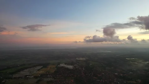 A quick takeoff to the clouds, filmed from a drone in Bali. Stock Footage 231393126