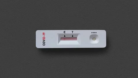Quick test unit to check for coronavirus on dark background Stock Footage 169756261