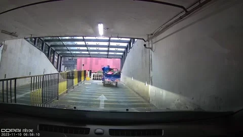 Quick-thinking driver avoids collision with runaway three-wheeler ahead on s... Stock Footage 259641514