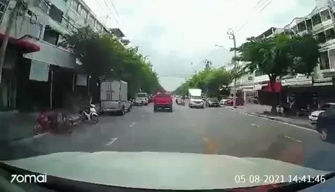 Quick Thinking Driver Dodges Falling Motorcyclist, Thailand - 05 Aug 2021 Video stock 205382560