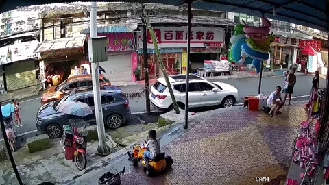 Quick-thinking father saves son from falling down stairs in China Stock Footage 272885728