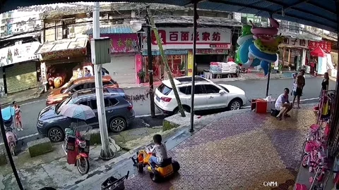 Quick-thinking father saves son from falling down stairs in China Stock Footage 276492680
