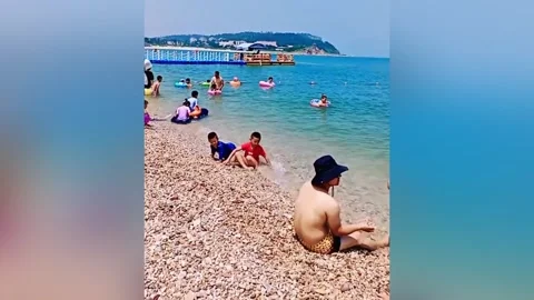 Quick-thinking man rescues drowning boy in eastern China Stock Footage 272984539
