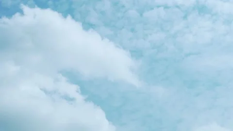 Quick Timelapse of Transforming 4K White Clouds in a Blue Sky on a Sunny Day. Be Stock Footage 159783596