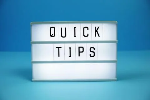 Quick Tips letterboard text on LED Lightbox on blue background Stock Photos