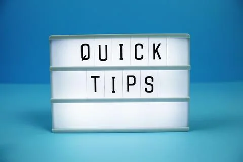 Quick Tips letterboard text on LED Lightbox on blue background Stock Photos