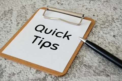 Quick tips text on notepad. Business quick tips concept Foto stock