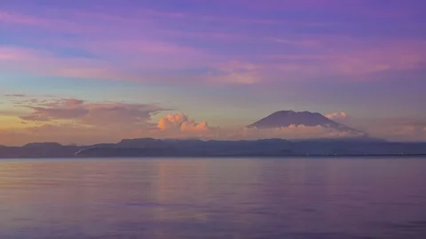 Quick Twilight over the Volcanic Island. Time Lapse 動画素材 106459284