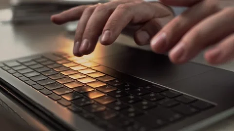 Quick typing on a laptop keyboard in the office. Stock Footage 307598505