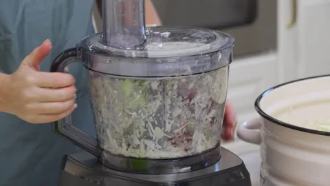 Quick Work: Home Cook Operates Food Processor to Shred Cabbage for Fermentation. Stock Footage 321152455