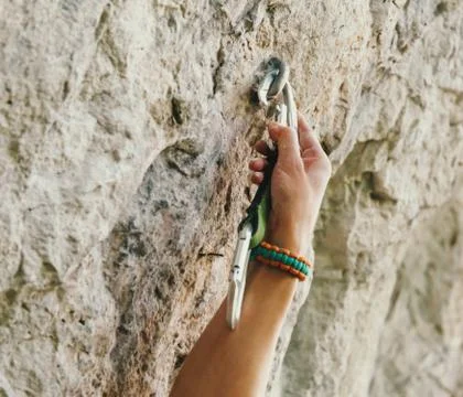 Quickdraw in anchor on rock Stock Photos