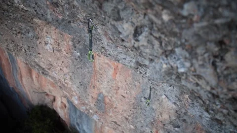 Quickdraws hanging from the climbing wall 15 스톡 동영상 252126101