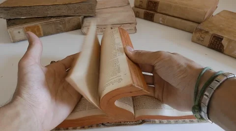 Quickly browse through an old book Stock Footage 53480791