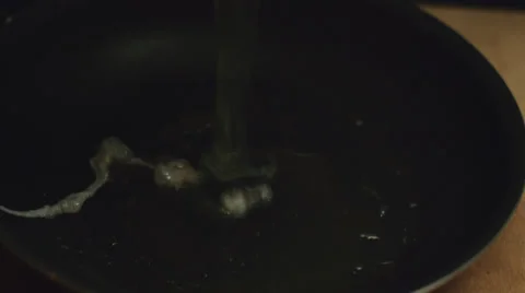 A quickly cooking egg Stock Footage 52550848