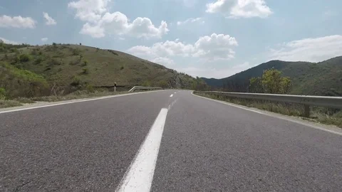 Quickly drive a motorcycle on the highway Stock Footage 83275903