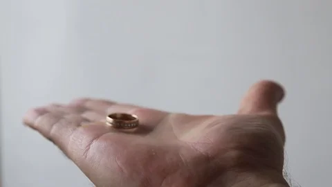 Quickly show a gold ring with diamonds. Close-up in the palm Stock Footage 123820355