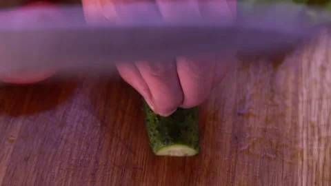 Quickly slice a cucumber with a knife Видео 132387126