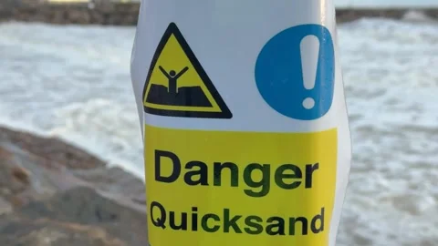 Quicksand Danger Warning Sign On Beach, Environmental Hazard And Safety Stock-Footage 336798591