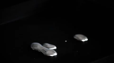 Quicksilver moving on black surface Stock Footage 61817749