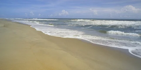 Quiet beach and wave moving towards the coast Stock Footage 103493002