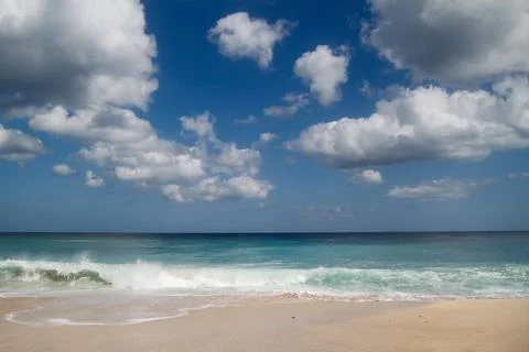 A quiet beach in Bali, called Dreamland Beach. Stock Photos
