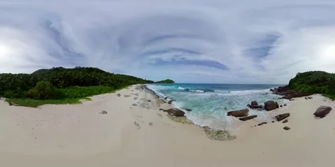 Quiet beach with large boulders and forest backdrop. Mahe, Seychelles. Stock Footage 343335053
