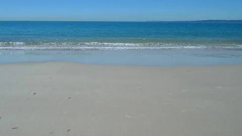 Quiet Beach With Rolling Waves Stock Footage 79081484