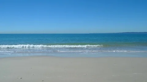 Quiet Beach With Rolling Waves Stock Footage 79082536