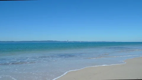 Quiet Beach With Rolling Waves Stock Footage 79084153