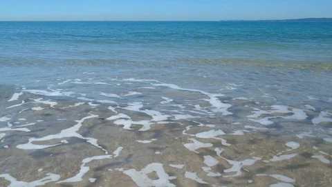Quiet Beach With Rolling Waves Stock Footage 79087189